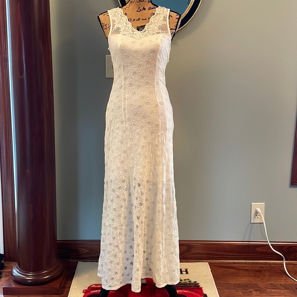 No brand name, cream white dress. Please see measurements below.